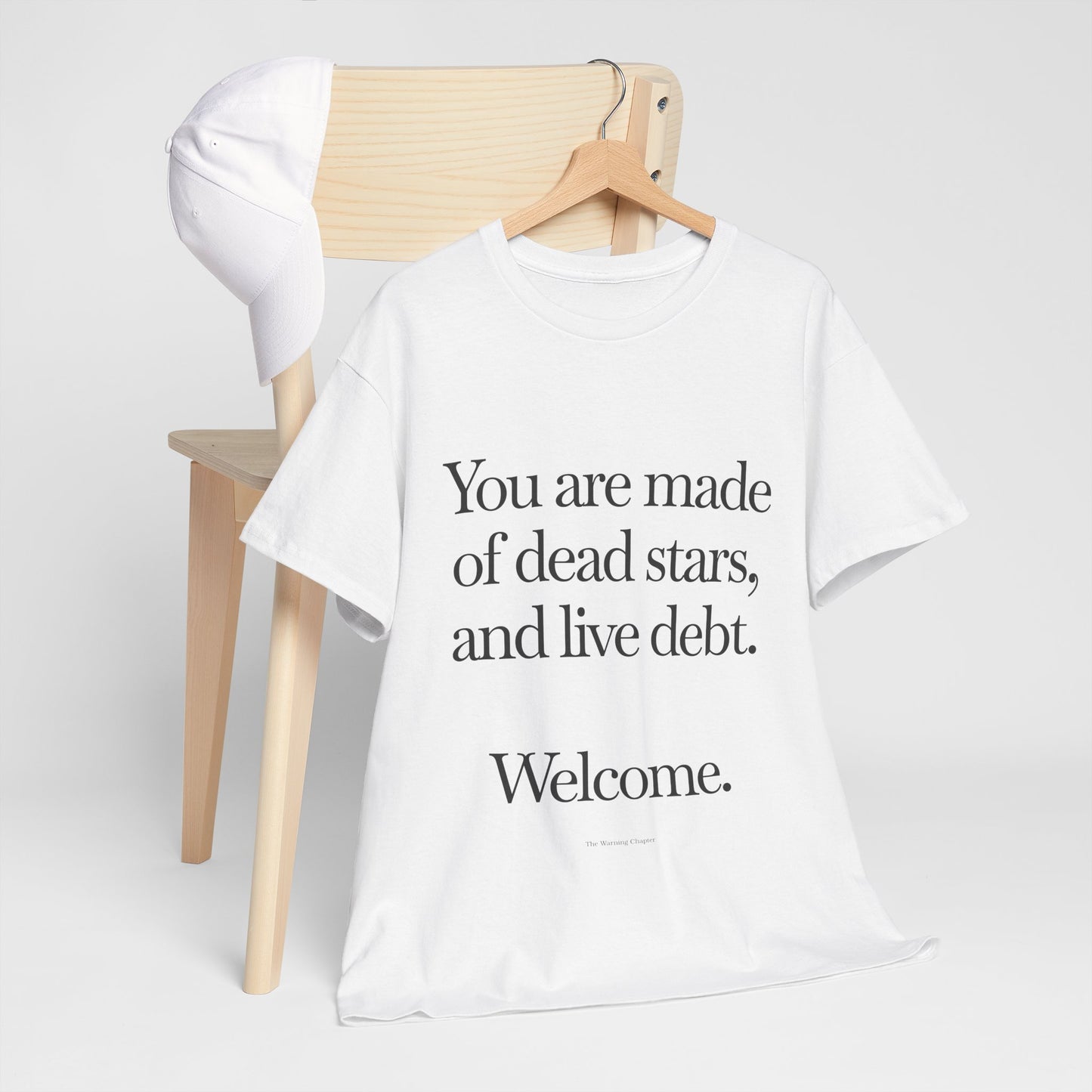 T‑Shirt — "You are made of dead stars, and live debt. Welcome." Minimalist Quote Tee