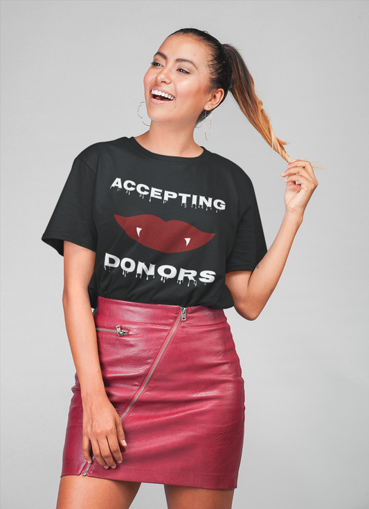Accepting Donors vampire tee featuring dark gothic humor and vampire-inspired statement apparel from The Warning Chapter. Back has fags and dripping drops of red